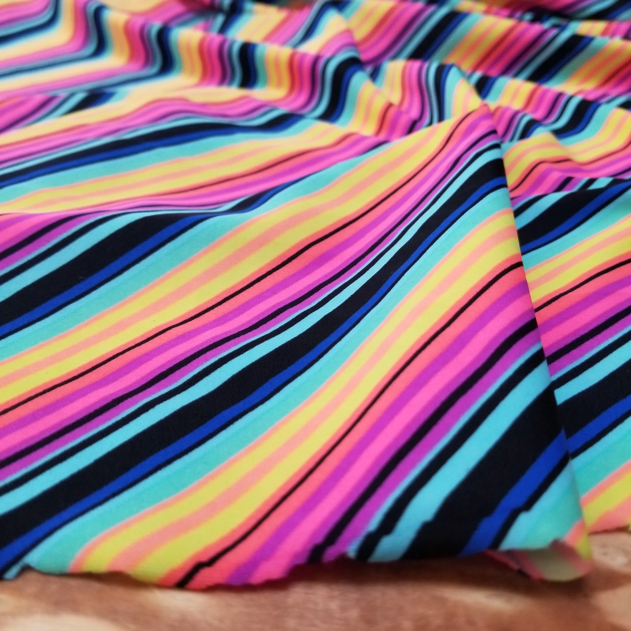 End of Bolt: 27 inches x 56 inches Nylon Spandex Diagonal Stripe Swim/Activewear Knit- Remnant