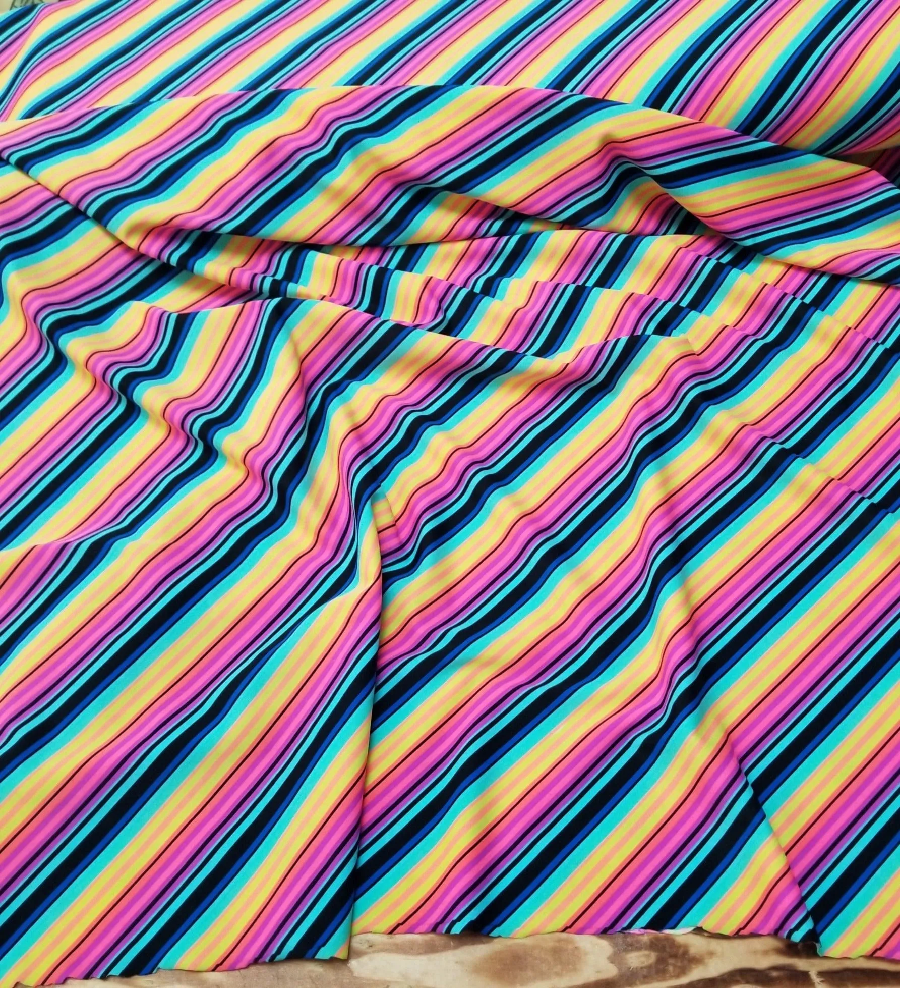 End of Bolt: 27 inches x 56 inches Nylon Spandex Diagonal Stripe Swim/Activewear Knit- Remnant