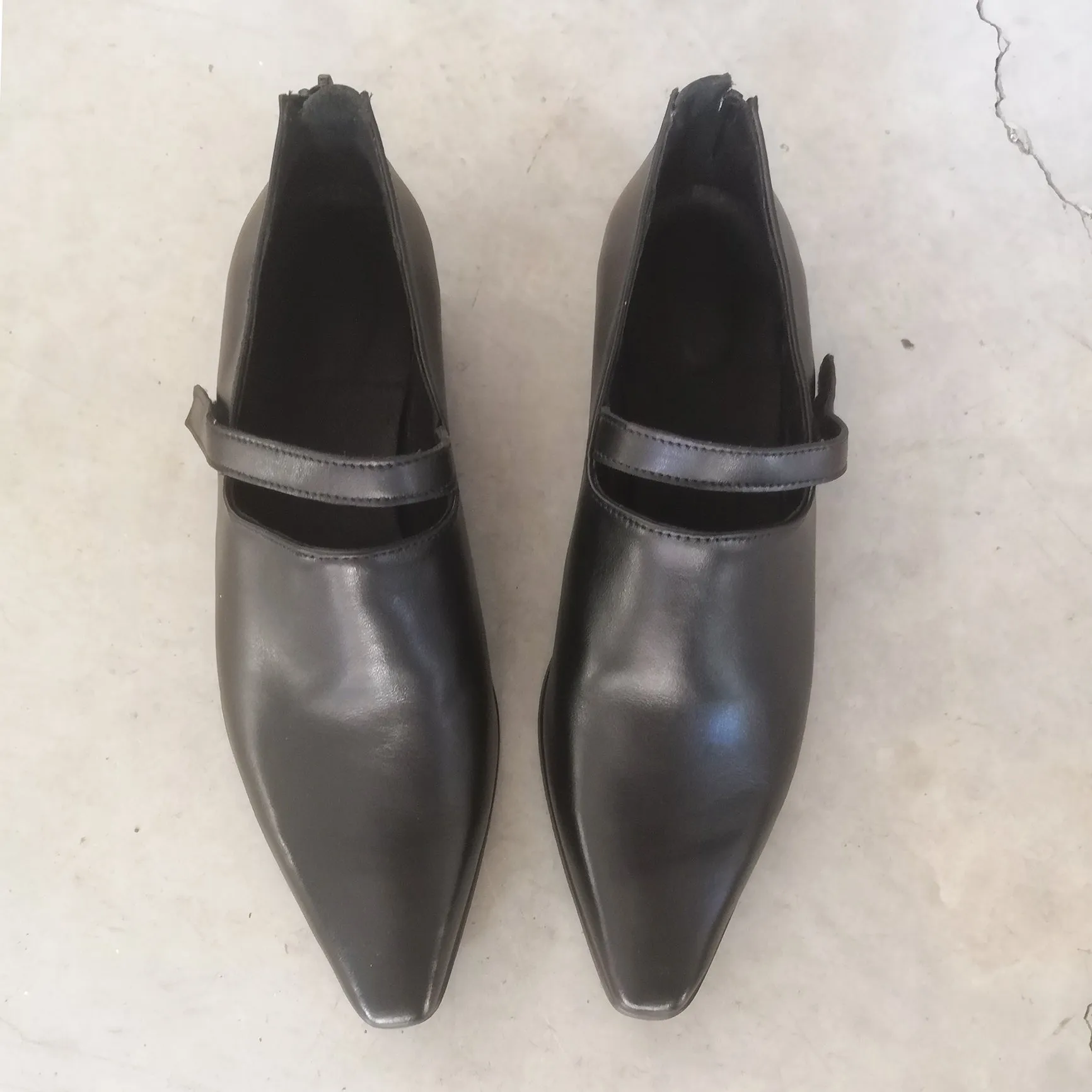 Hand Carved Shoes In Black